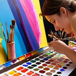 A person deeply engrossed in painting, surrounded by vibrant colors and artistic tools, reflecting the joy of creative expression.